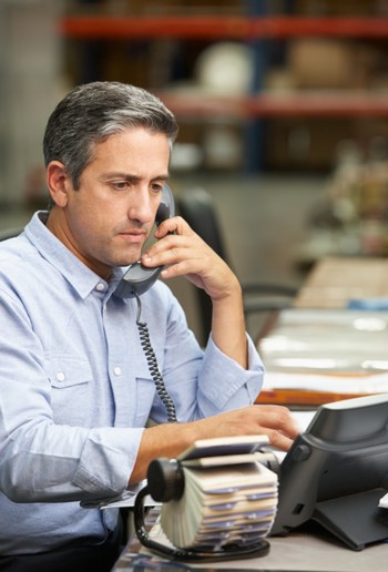 Businessman who needs new phone features